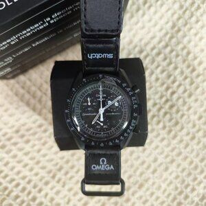 Mission watch with black NEW moon pattern